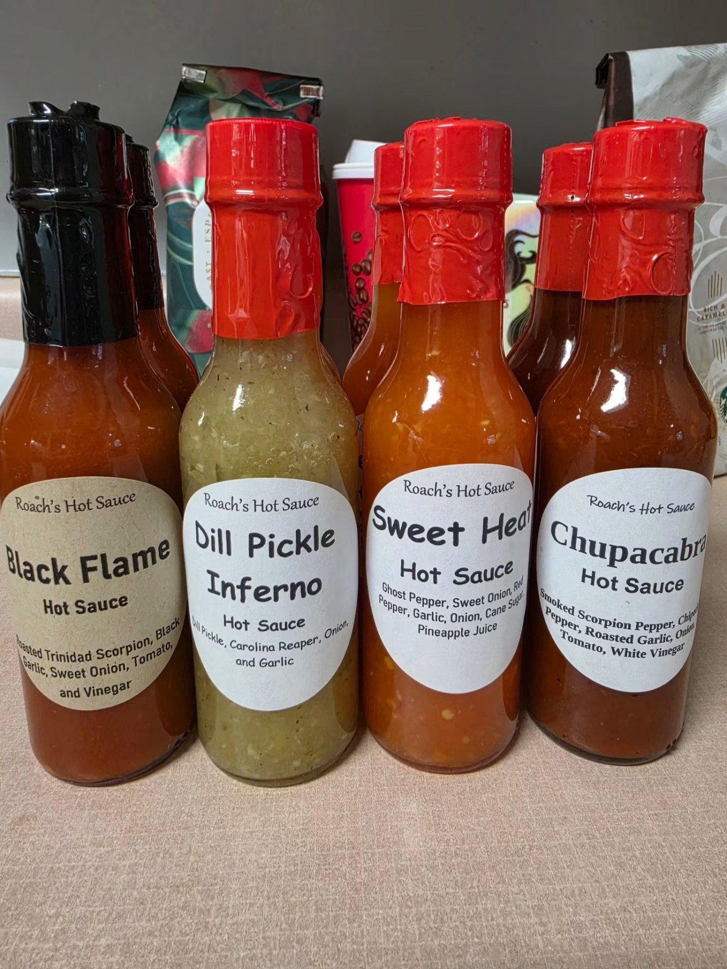 All four Roach's Hot Sauce bottles